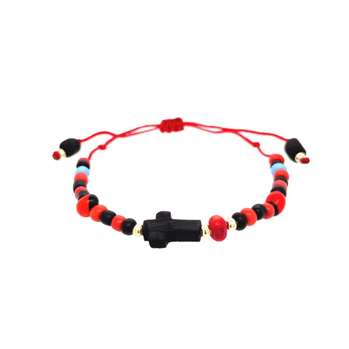 This Genuine Jet Azabache Red String Bracelet for Adults showcases vibrant beaded patterns with alternating red, black, and blue beads, highlighted by a central black bead in the shape of a cross. Strung on an adjustable red cord, it combines style with positive energy for those seeking protection from the evil eye.